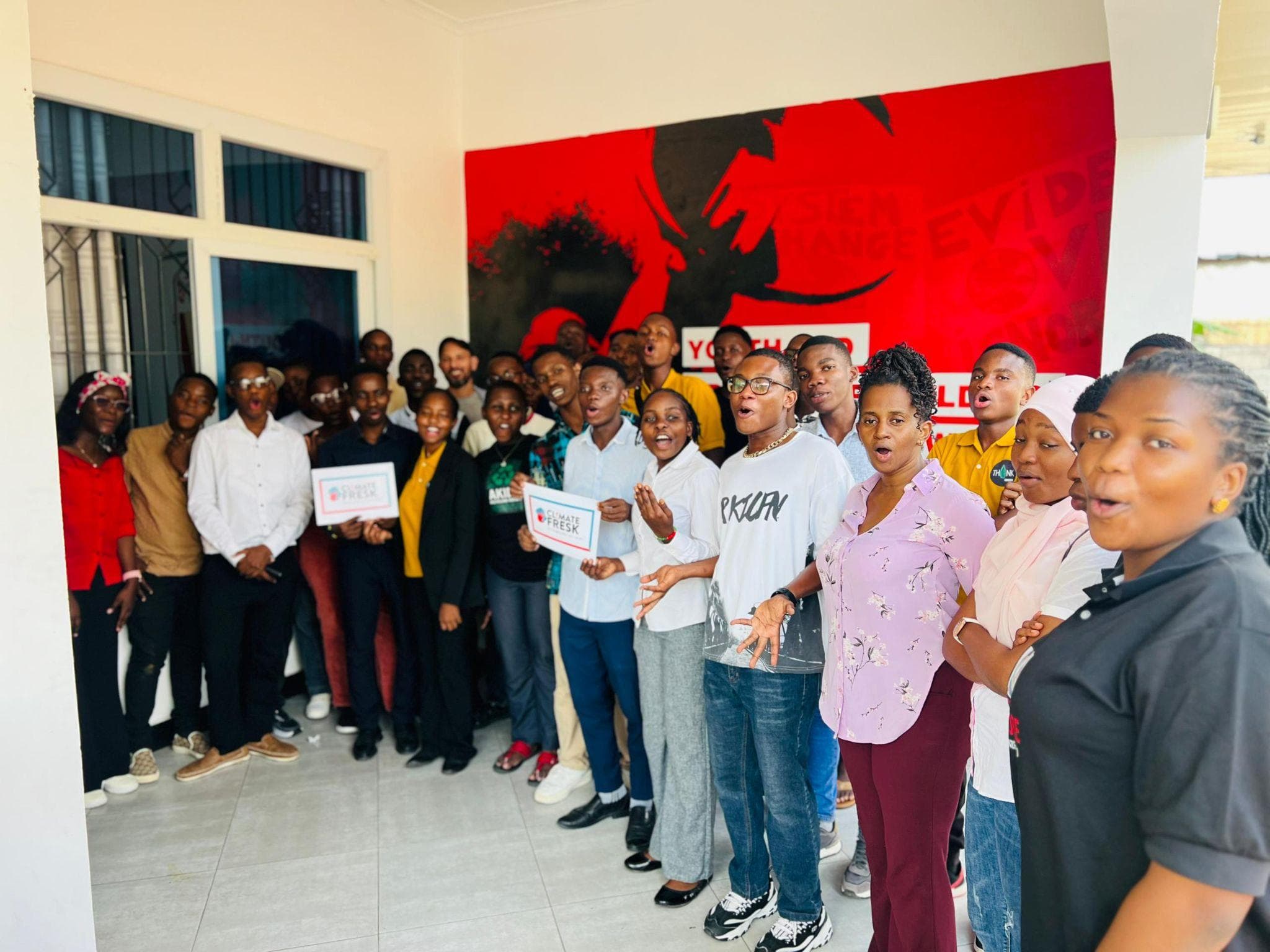 Participants celebrating together with certificates at the end of the event.